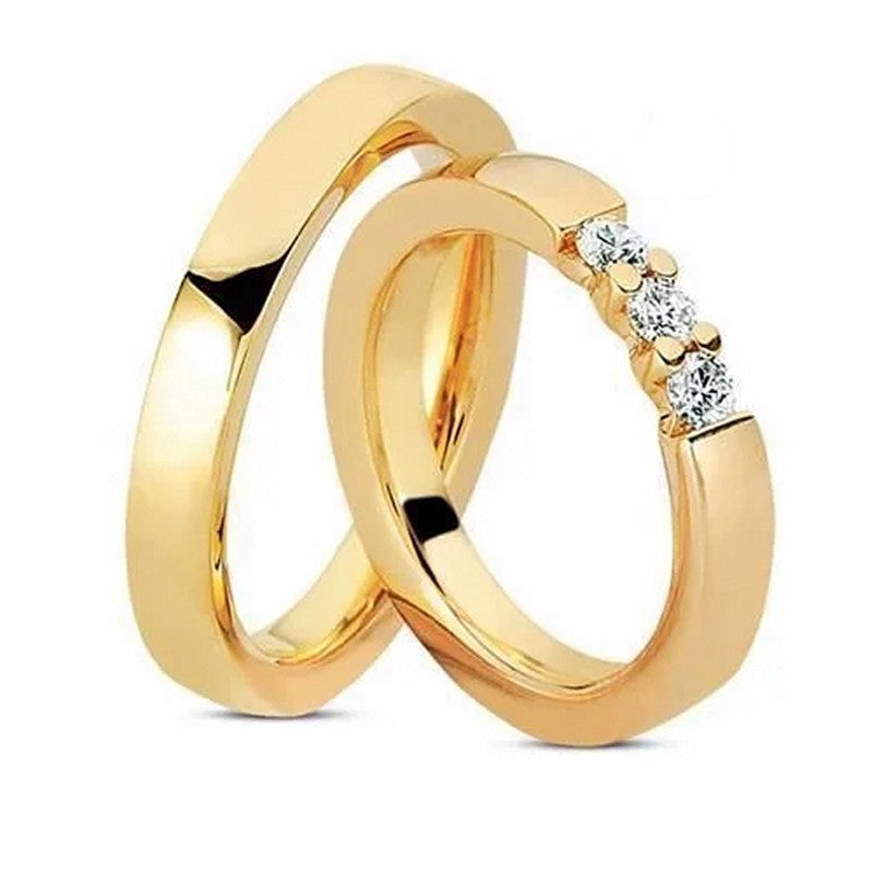 Unikke Nuran vielsesringe i 14 karat guld med damering med tre diamanter i alt 0,30 ct.